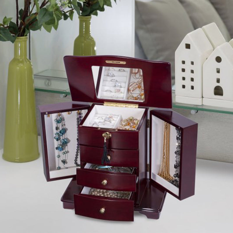 Cherry-finish wooden jewelry box open with multiple compartments and organizer trays