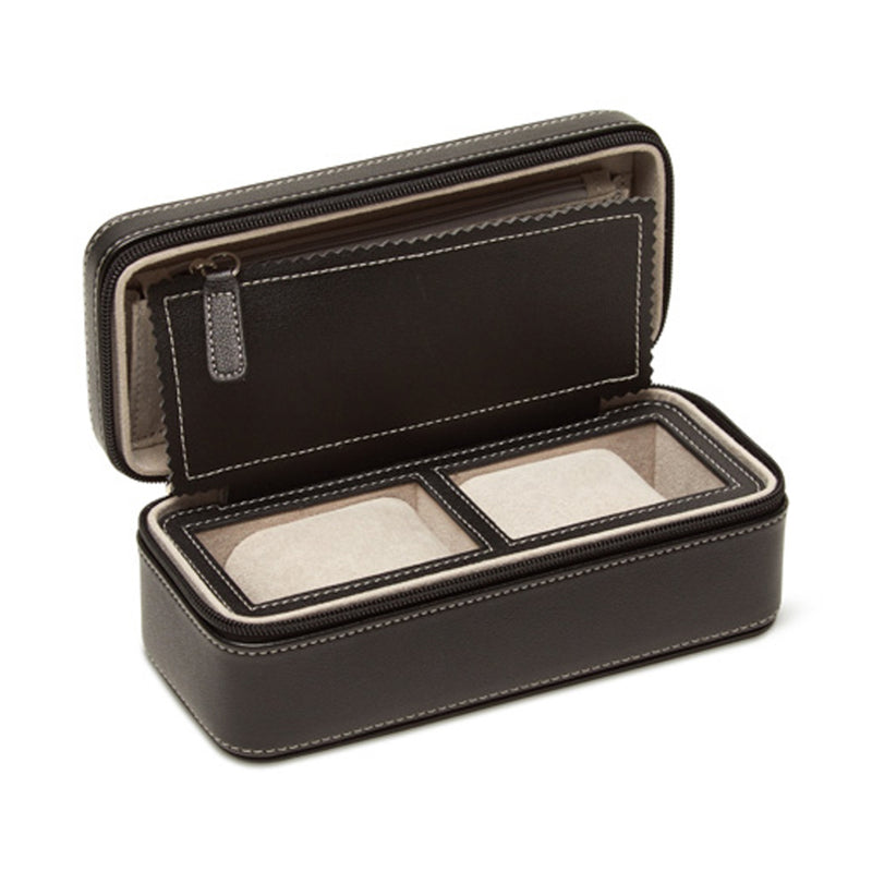 Black faux leather travel watch case with two cushioned watch slots, hinged open.