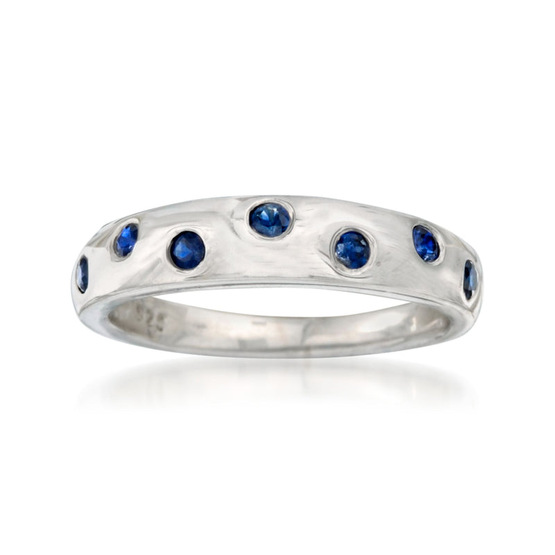 Sterling silver sapphire ring with five blue round gemstones on the band