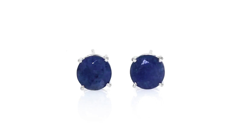 Pair of round blue sapphire stud earrings in sterling silver, front view
