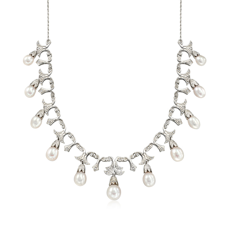 Sterling silver necklace with cultured pearl drops and diamond-like stations, adjustable chain