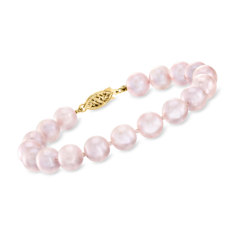 Pink cultured pearl bracelet with round pearls and 14kt yellow gold clasp