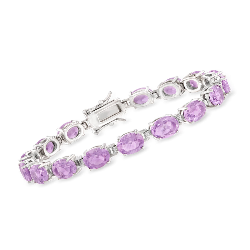 Sterling silver amethyst tennis bracelet with oval purple gemstones and box clasp