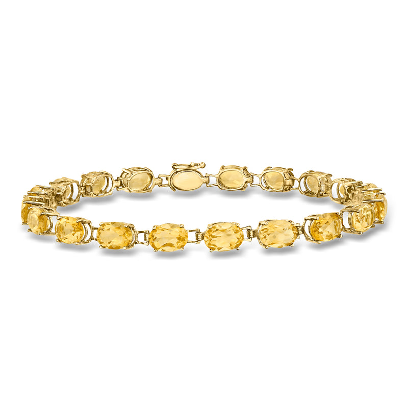 Citrine tennis bracelet in 14kt yellow gold with oval and round citrine gemstones