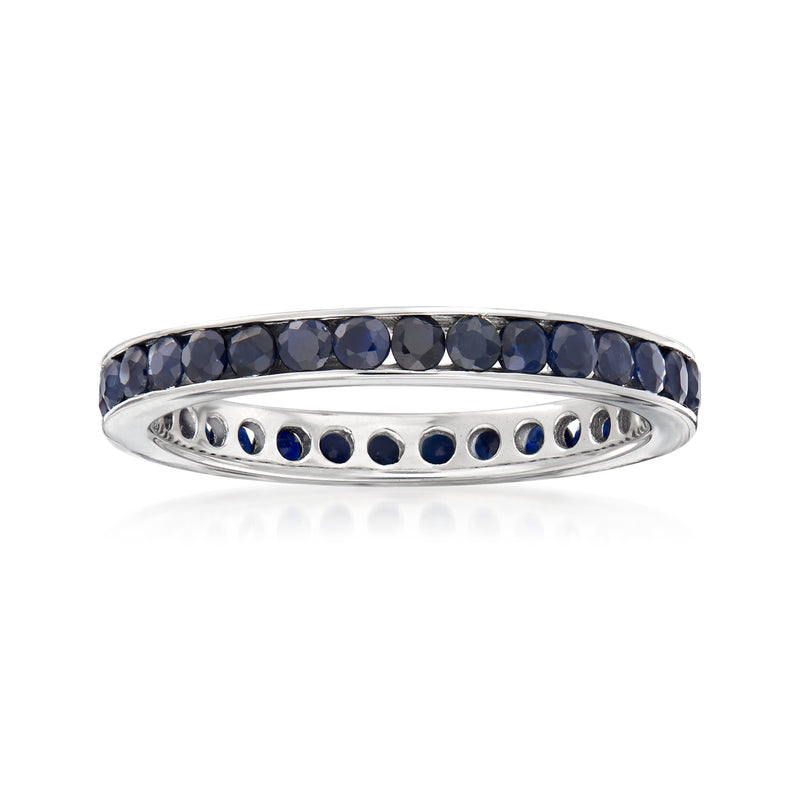 Sterling silver sapphire eternity band with dark blue round stones, slim profile.