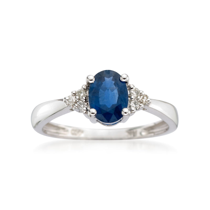 Oval sapphire and diamond accent ring in 14kt white gold, oval blue center