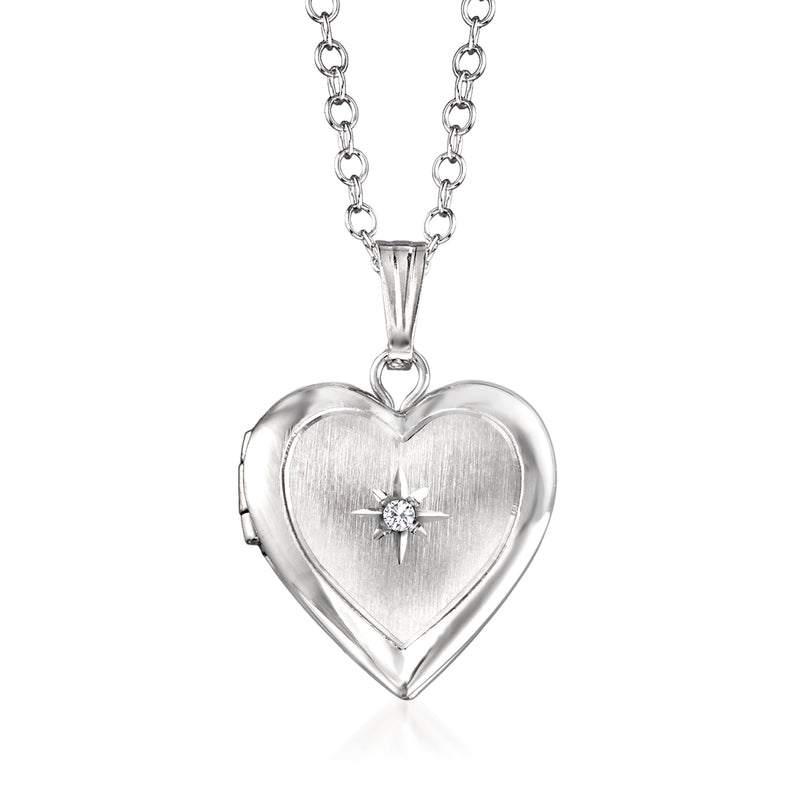 Child's heart locket necklace in sterling silver with small diamond centerpiece