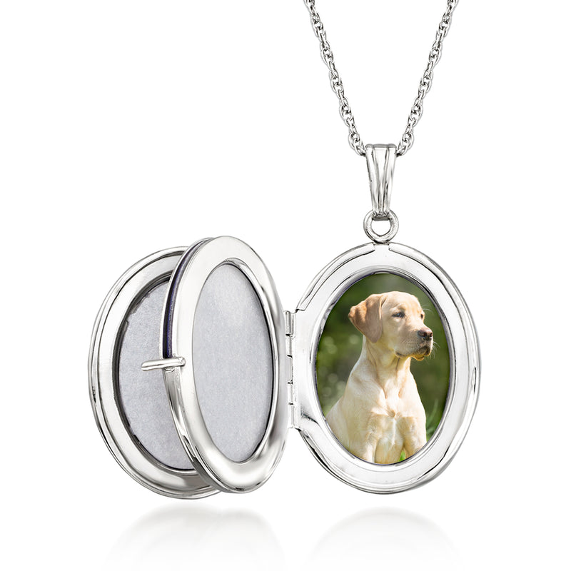 Sterling silver oval locket necklace, open with dog photo inside the frame