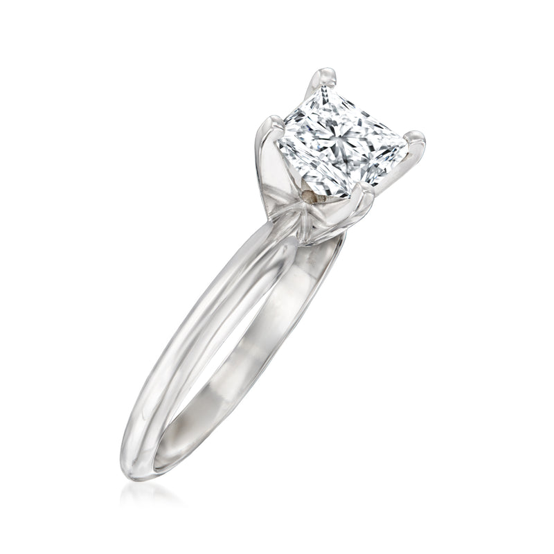 Princess-cut diamond solitaire in 14kt white gold, four-prong setting on angled band