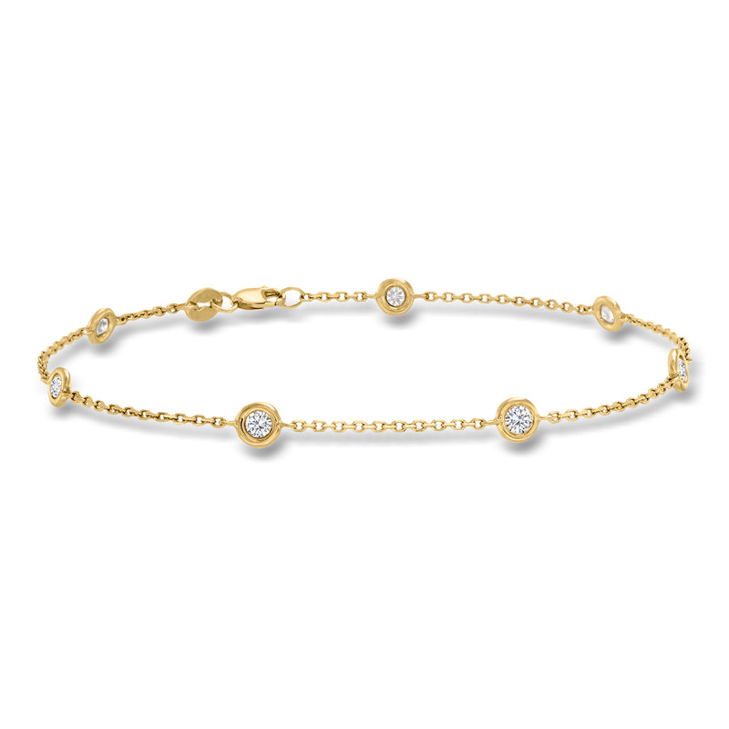 14kt yellow gold diamond station bracelet with round bezel-set stones