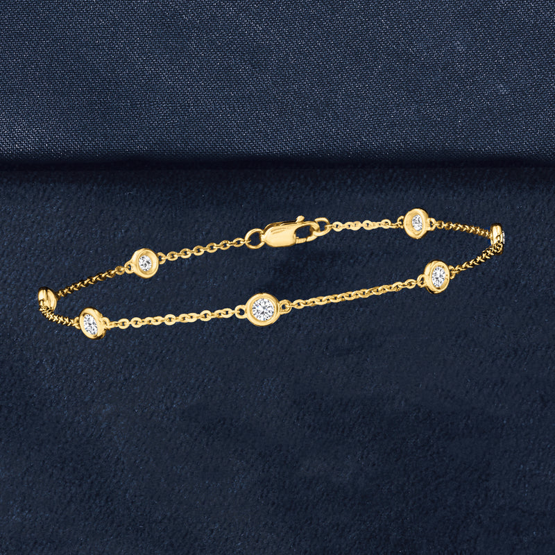 14kt yellow gold chain bracelet with round diamond stations, multiple links
