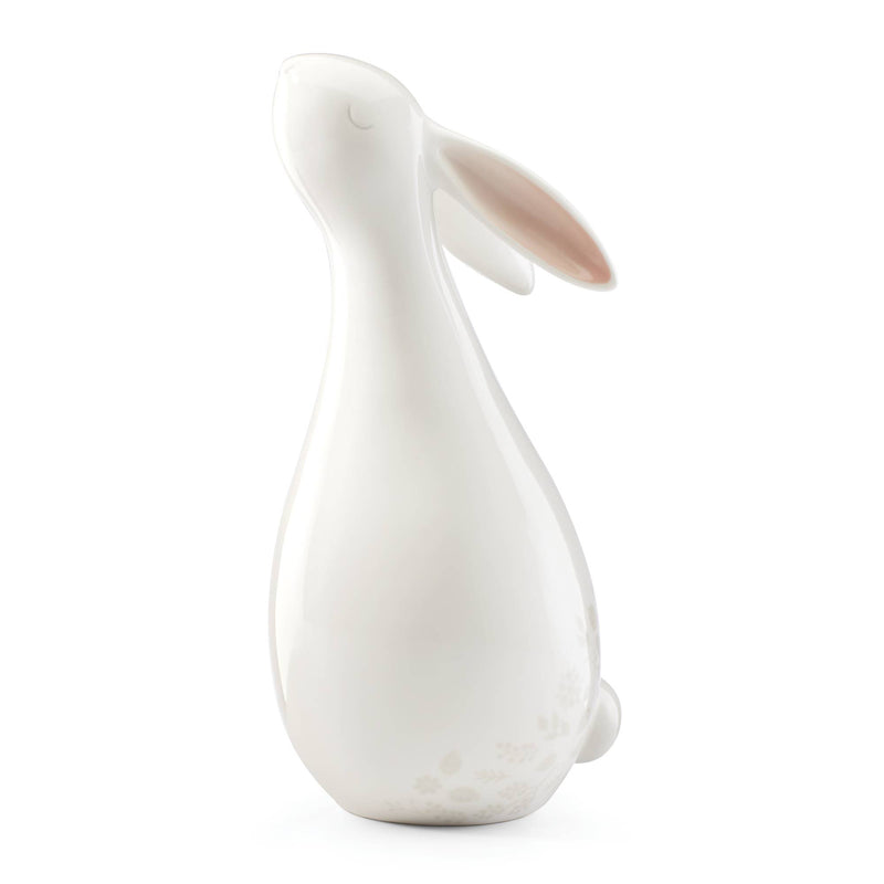 White porcelain bunny centerpiece figurine with molded handle and floral accents