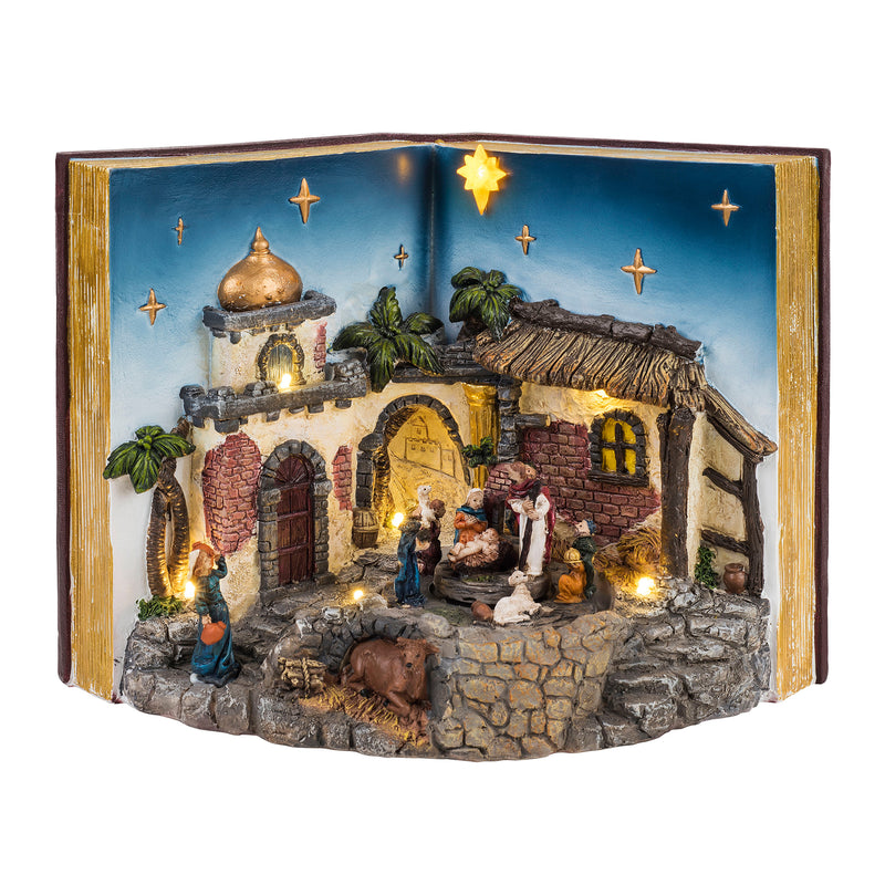 Decorative illuminated nativity scene with standing figures and warm LED lights