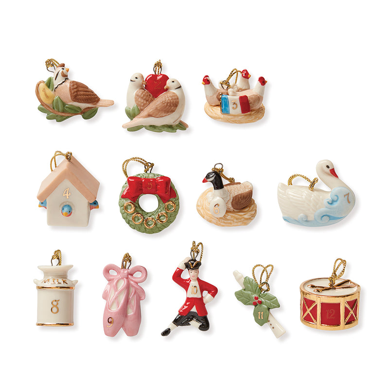 Set of 12 mini Christmas ornaments with mixed bird, house, wreath, and drum designs