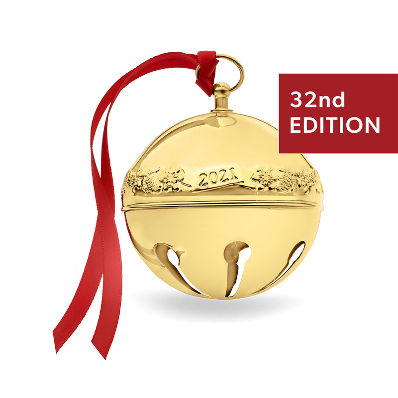 Gold sleigh bell ornament with red ribbon, 32nd edition medallion