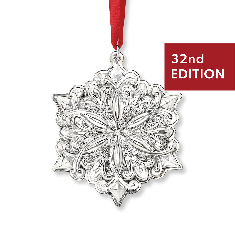 Sterling silver snowflake ornament with hanging loop, red ribbon