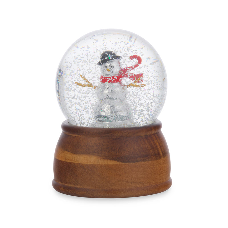 Snowman snow globe with glass dome and wooden base, red scarf and black hat.