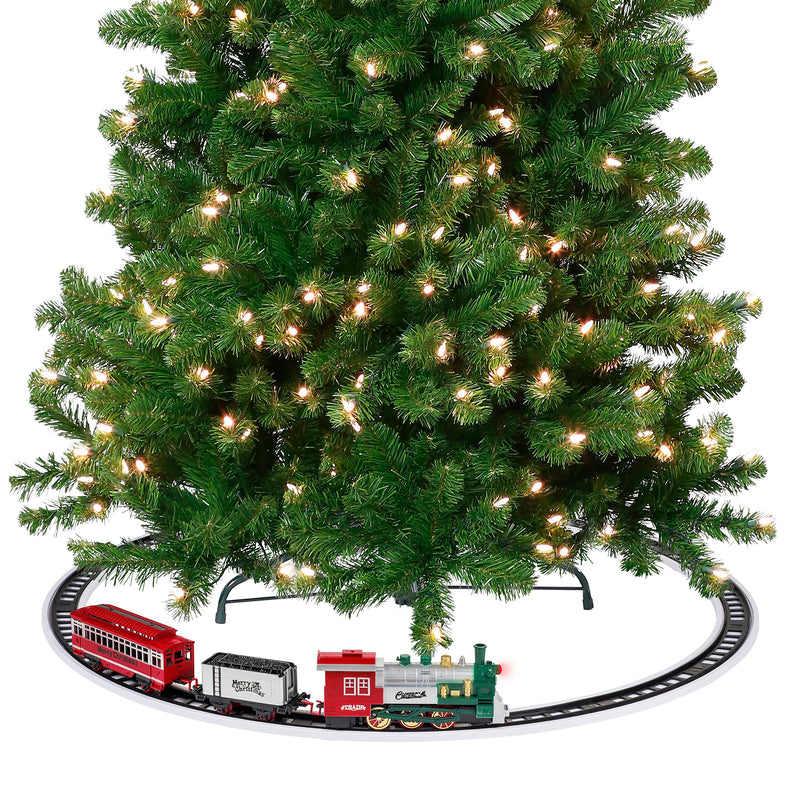 Pre-lit Christmas tree with red train around base track and mini buildings
