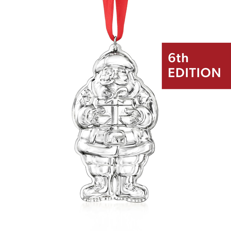 Sterling silver Santa ornament, 6th edition, hanging with red ribbon