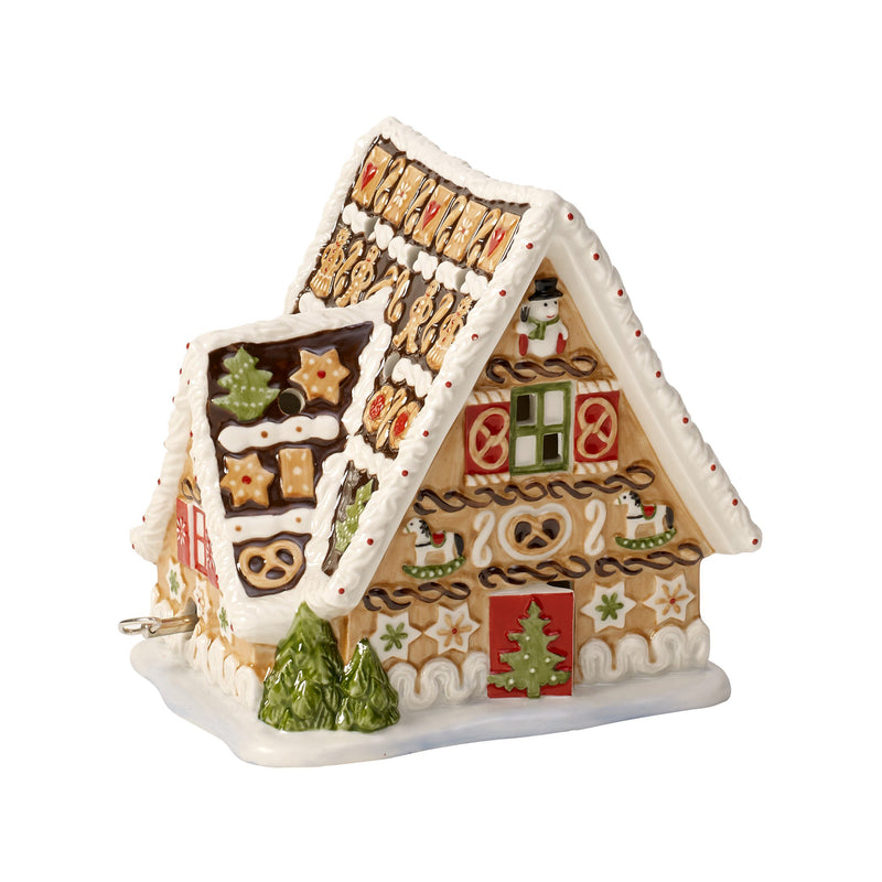 Villeroy & Boch gingerbread house music box with painted candy ornaments, white roof