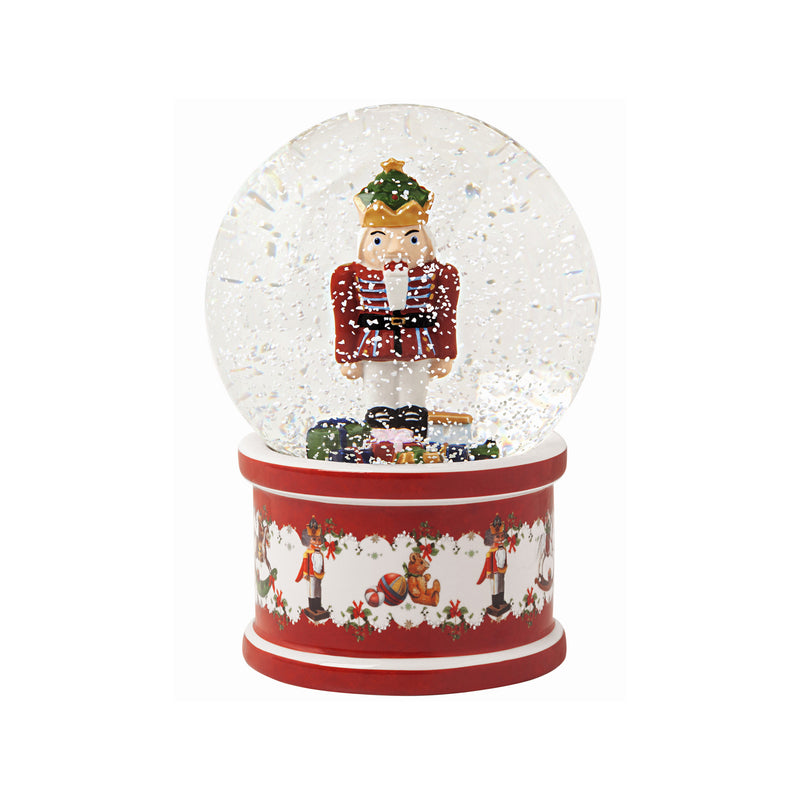 Villeroy & Boch nutcracker snow globe with red base and glass globe, winter scene
