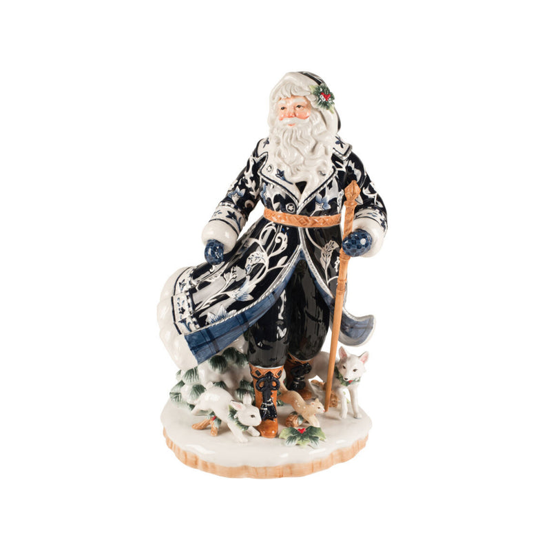 Fltz and Floyd Santa figurine with long white beard, dark patterned coat and toy animals