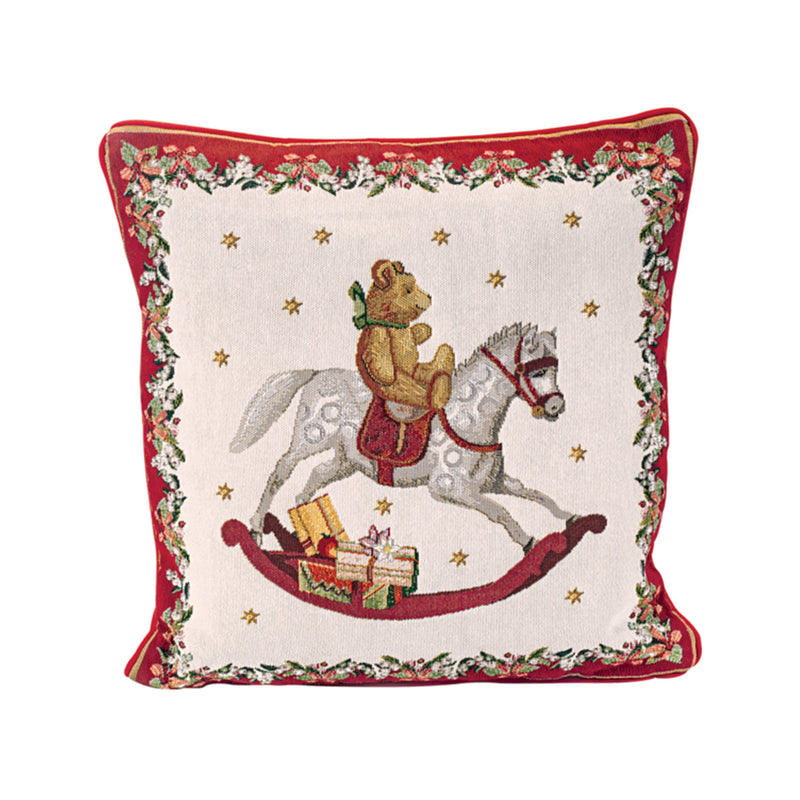 Square throw pillow with red trim, rocking horse and angel, star print on light background