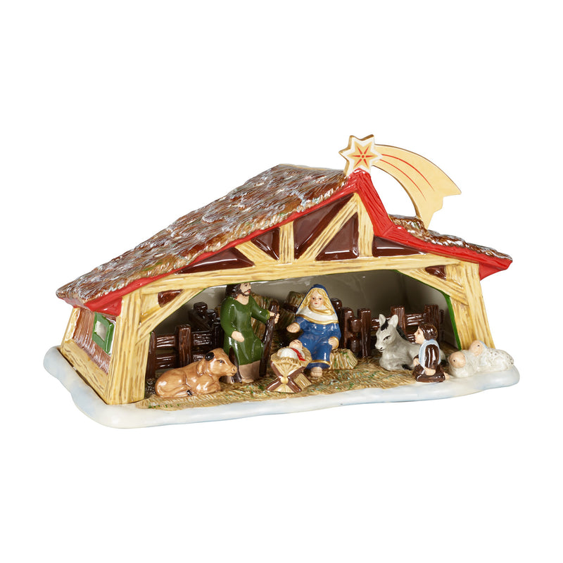 Nativity scene figurine with painted stable, seated figures and red star roof