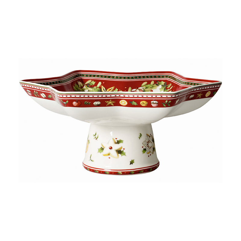 Red and white star-shaped footed serving bowl with holiday wreath and berry pattern