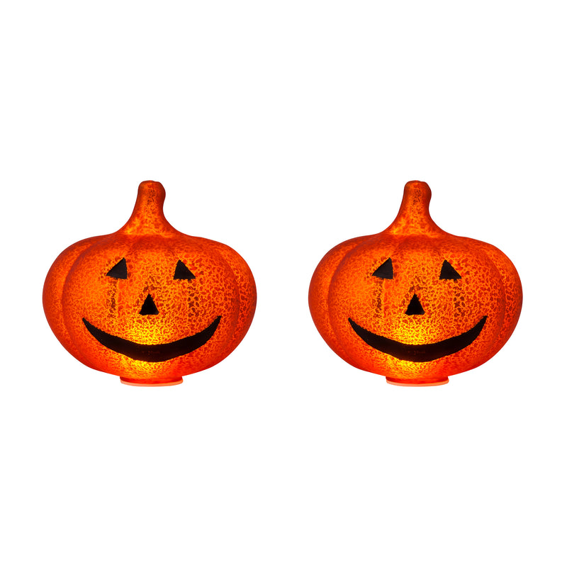 Set of two orange jack-o'-lantern mercury glass lights with black cutout faces