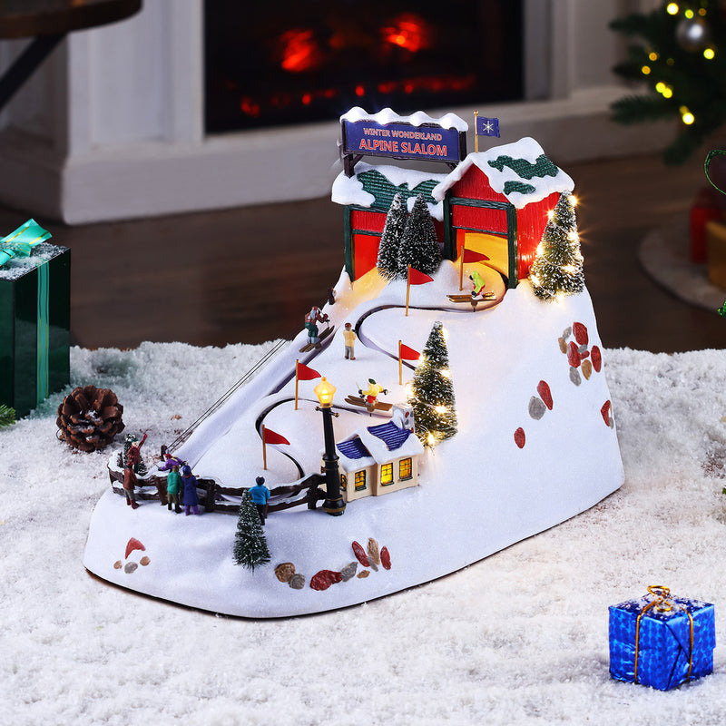 Animated alpine ski slope village with lit trees, chalet, and winding track on snow