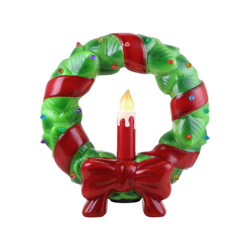 Green and red blow-mold wreath with candle center and ribbon bow