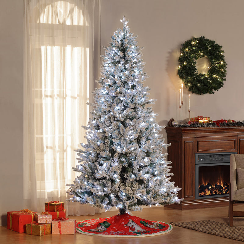 Flocked artificial mountain fir Christmas tree with lights
