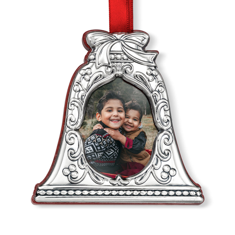 Sterling silver bell photo frame ornament with oval portrait window and ribbon loop