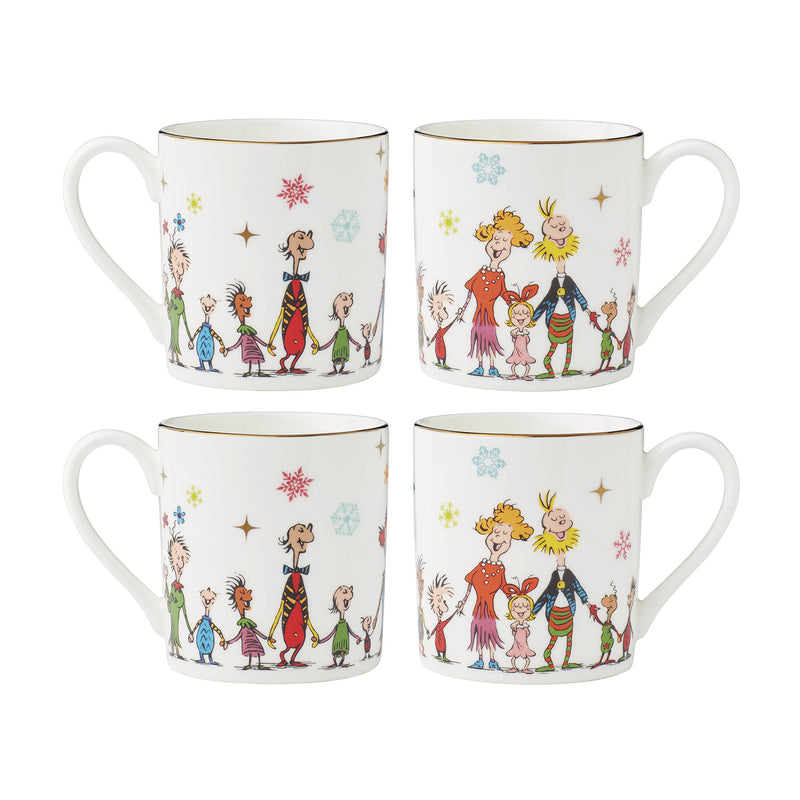 Set of four porcelain holiday mugs with illustrated character scenes and gold rim
