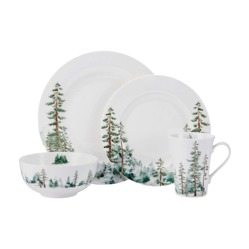 White forest-themed dinnerware set: plates, bowls, and mugs with tree design