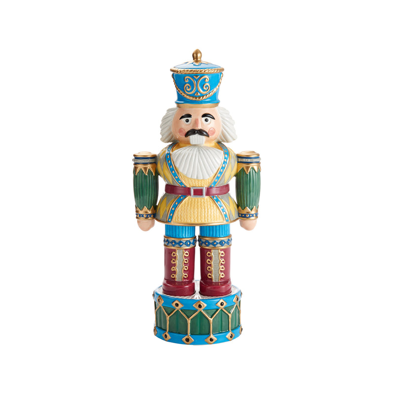 Earthenware nutcracker soldier figurine in blue, gold, green, and red with hat