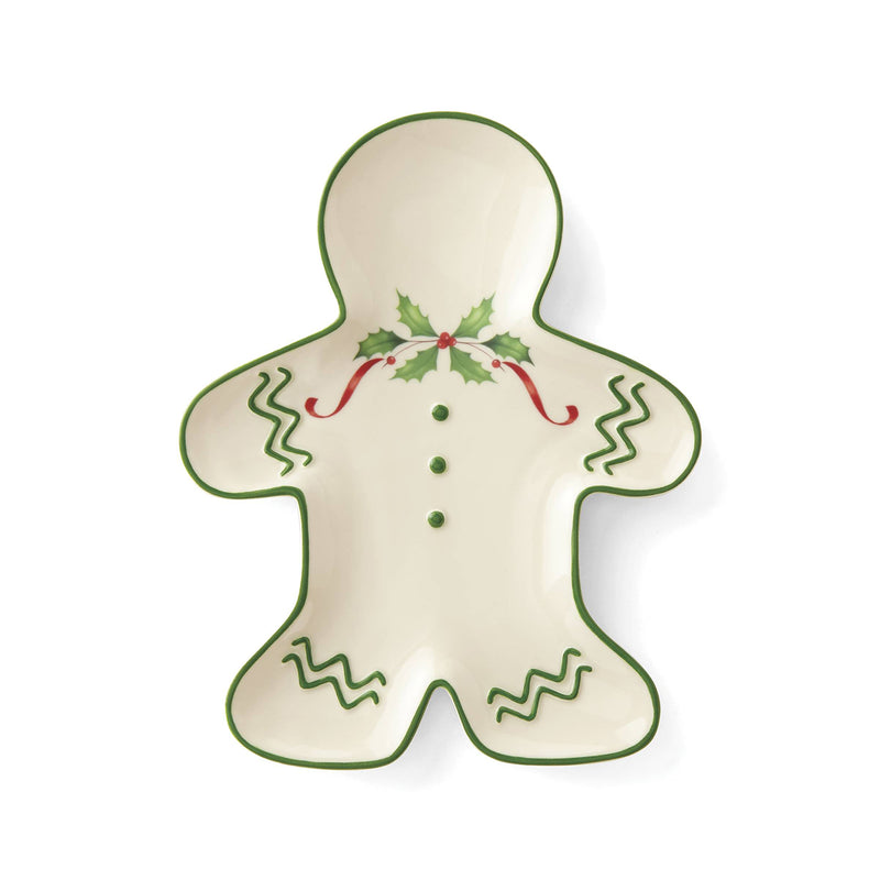 Porcelain gingerbread man accent plate, cream with green trim, holly and red bow details