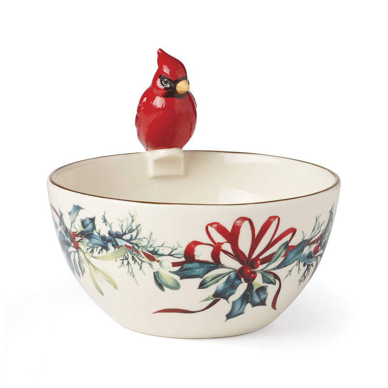 Porcelain serving bowl with red cardinal finial and winter floral pattern lid