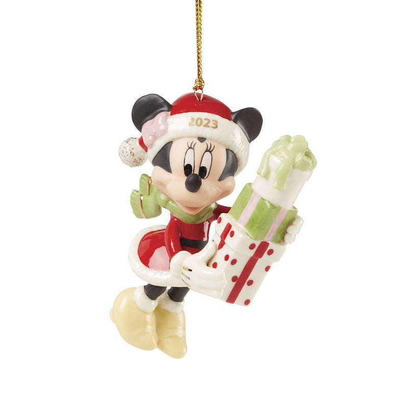 Porcelain Minnie holiday ornament holding a wrapped present, red and green details