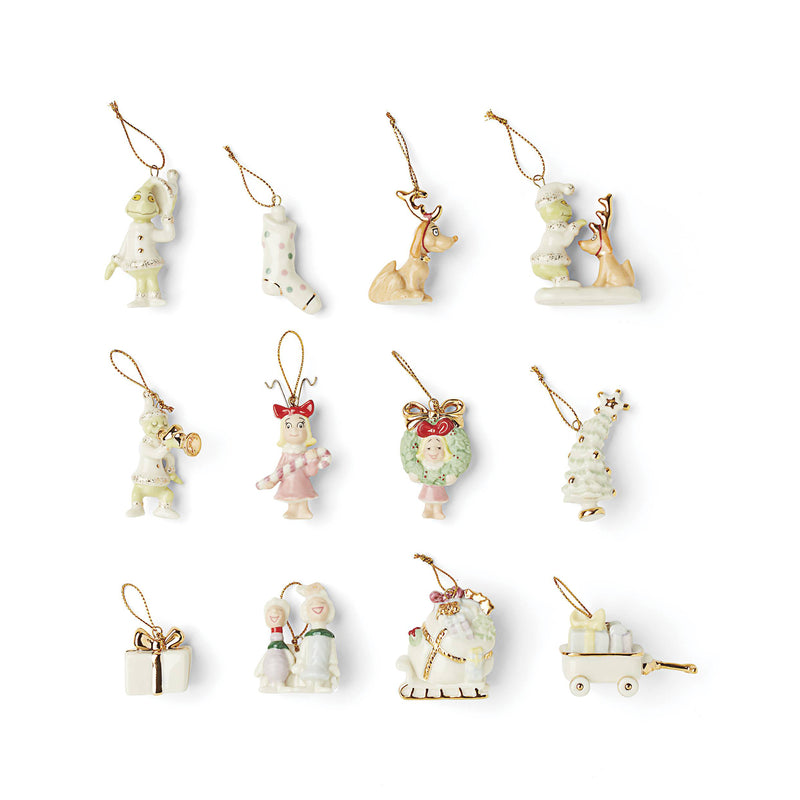 Set of 12 mini holiday character ornaments with hanging strings and small figurines