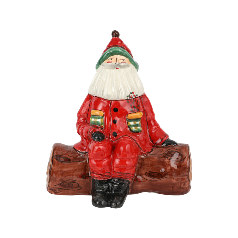 Red ceramic Babbo Natale figurine with white beard, green hat, seated pose