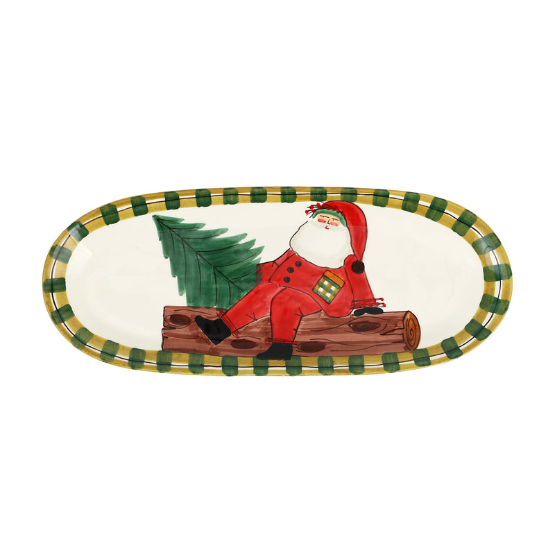 Vietri ceramic oval platter with red Santa, green tree, and green plaid border