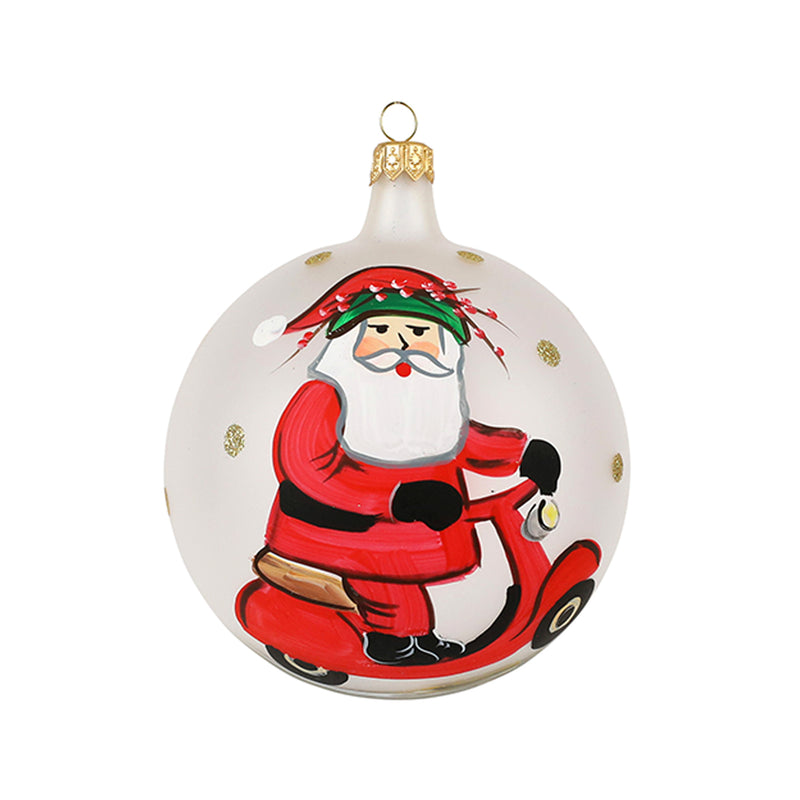 Vietri Old St. Nick Vespa ornament: Santa on red scooter, round white hanging bauble