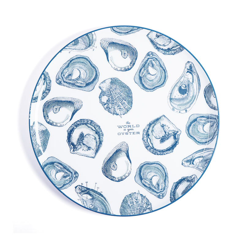 Round blue and white iron tray with oyster shell graphic and small center text