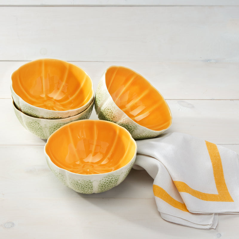 Melon ceramic bowls with orange interior glaze, speckled white exterior (set of four)