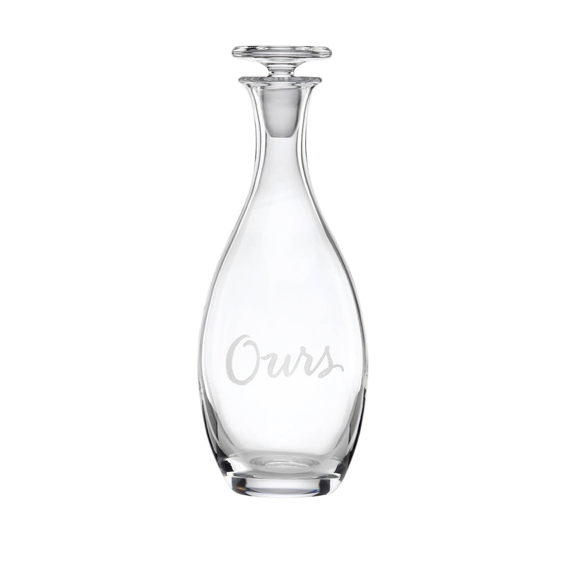 Kate Spade New York Ours clear glass decanter with narrow neck and embossed logo