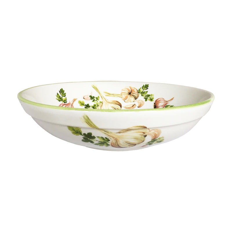 White ceramic round serving bowl with green herbs and garlic pattern