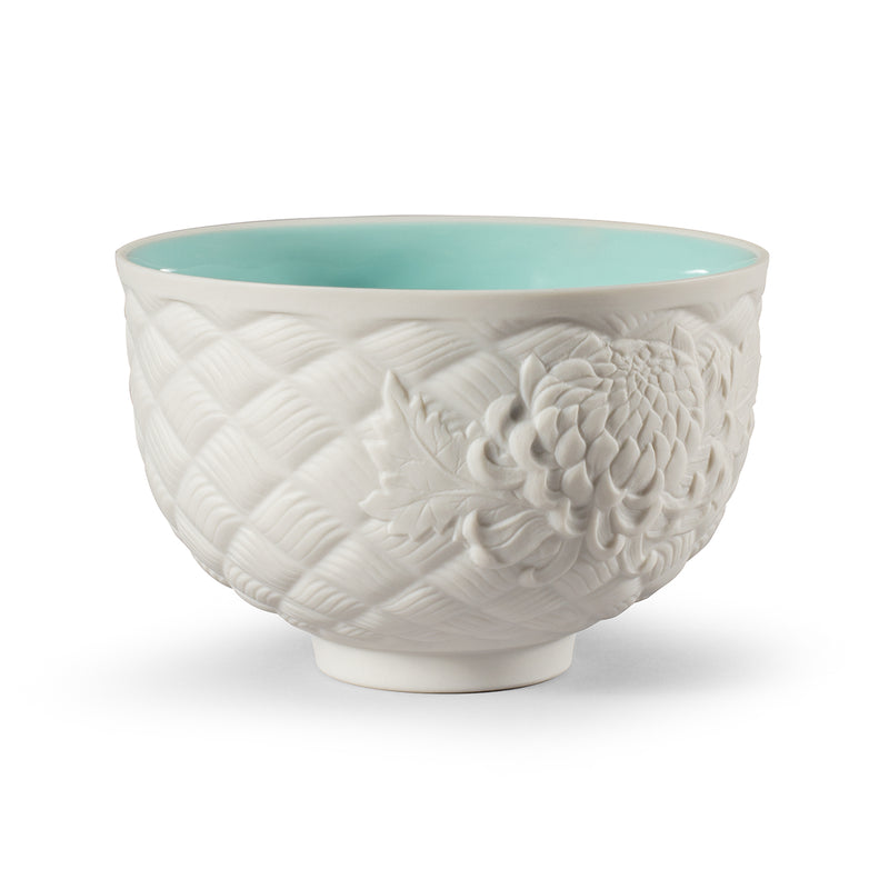 Lladro porcelain winter tea cup, white embossed floral design, teal interior rim