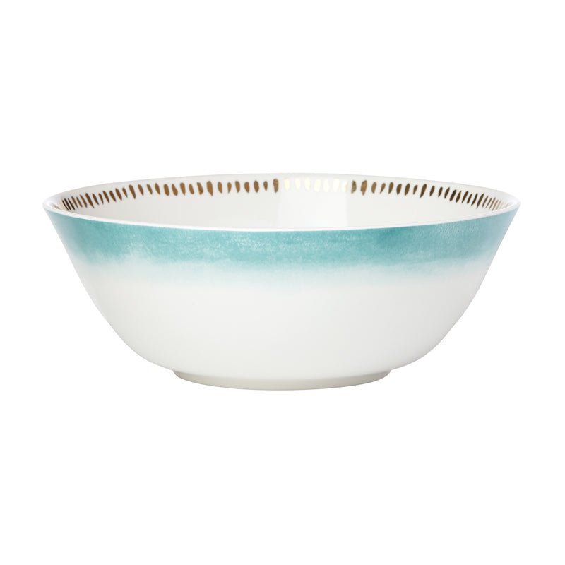 Large serving bowl with blue ombre rim and speckled edge, white ceramic